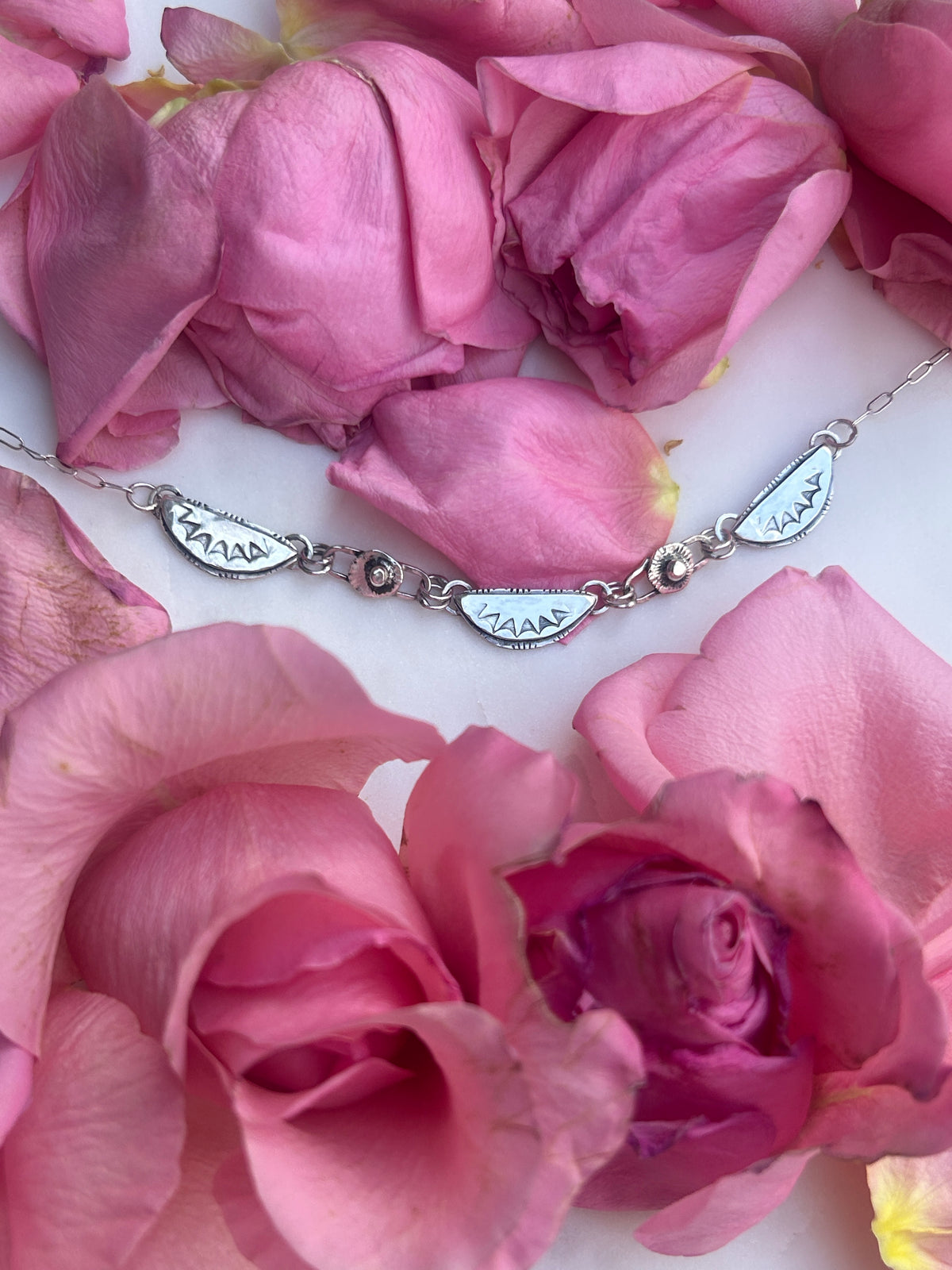Sterling Silver Bib necklace, thin chain.