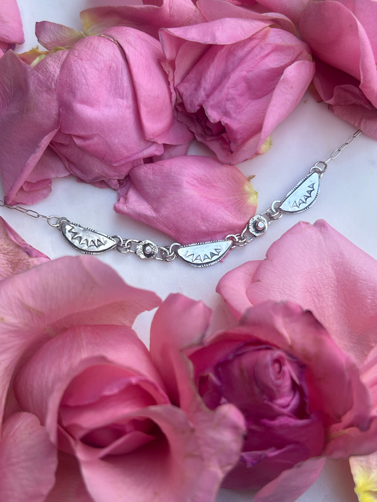 Sterling Silver Bib necklace, thin chain.