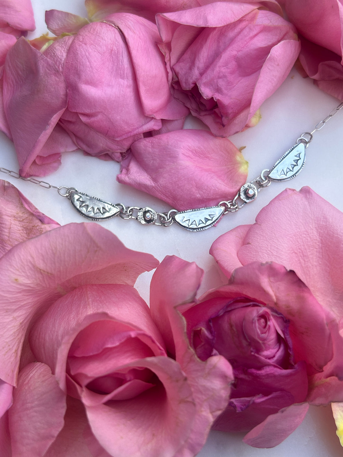 Sterling Silver Bib necklace, thin chain.