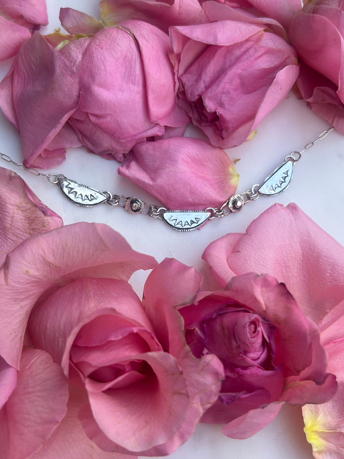 Sterling Silver Bib necklace, thin chain.